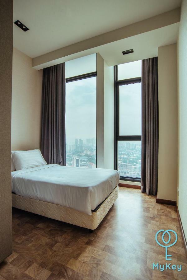 الشقق الفندقية كوالالمبورفي  أجنحة إكسبريشنز بروفيشنال من ماكي غلوبال المظهر الخارجي الصورة A bedroom at the hotel